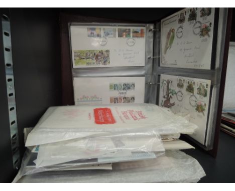 A collection of First Day Covers and Presentation Packs, GB interest, album and packets