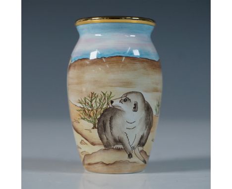 This Moorcroft enamel vase is a charming miniature piece, capturing a family of meerkats in their natural habitat with remark
