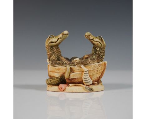 This collectible Harmony Kingdom Treasure Jest box figurine, titled Croc Pot, was released in 1997. The intricately crafted r
