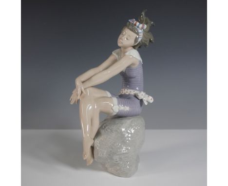 A beautifully crafted Lladro porcelain figurine titled Bathing Beauty (model #01005615), designed by Regino Torrijos. This el
