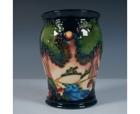 Designed by Emma Bossons, this Moorcroft pottery vase showcases a serene landscape, capturing the essence of twilight with ro