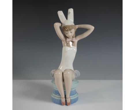 Delightful Lladro porcelain figurine titled Bunny (model #01005163), designed by Salvador Debon. This charming piece features