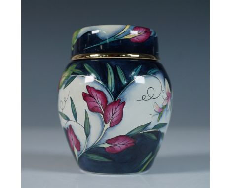 Designed by Amanda Rose, this limited edition Moorcroft enamel ginger jar presents an exquisite botanical motif with rich det