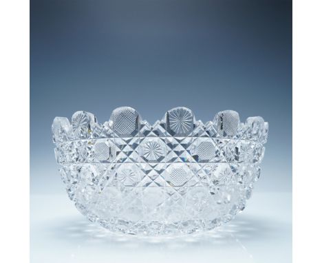 Exquisite American Brilliant Period cut glass bowl featuring a striking hobstar, fan, and crosshatch pattern. The deeply cut 