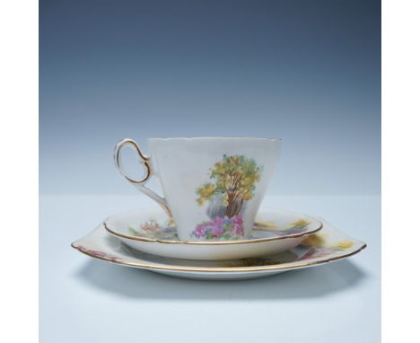 A three-piece Shelley fine bone china tea set from the Ideal Series, featuring a hillside landscape design. The set includes 