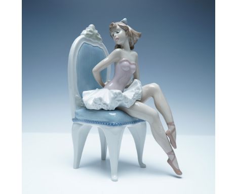 Elegant Lladro porcelain figurine titled Dressing for the Ballet (model number 01005865). This beautifully sculpted piece fea