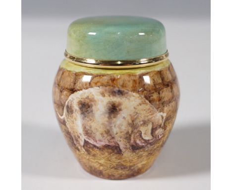 This Moorcroft enamel covered ginger pot is a limited-edition collectible, presented in its original box. The miniature piece