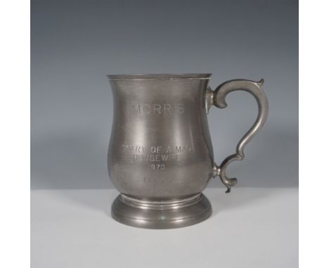 A vintage Williamsburg pewter tankard featuring an engraved dedication to "Morris" and referencing the 1970 film Diary of a M
