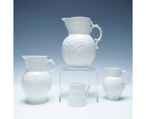 This lot includes a collection of four English porcelain jugs, each featuring a distinct design. Three of the jugs are part o