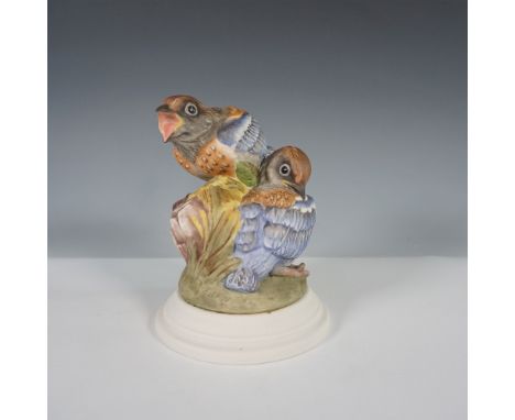 A finely crafted Boehm porcelain figurine titled Fledgling Western Bluebirds, model number 494. This hand-painted sculpture c