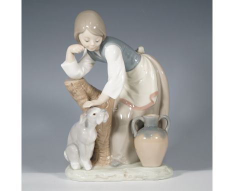 Lovely Lladro porcelain figurine titled "Caress and Rest," model number 1246, depicting a gentle pastoral scene of a young gi