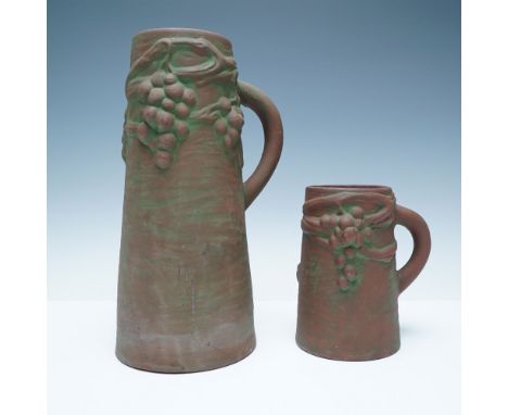 Peters &amp; Reed Moss Aztec art pottery designed by Frank Ferrell, featuring a textured brown and green finish with raised g