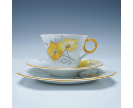 Three-piece tea set made of fine porcelain, featuring a design of yellow dog roses with grey leaves. The set includes a teacu