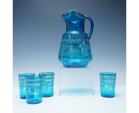 Exquisite Bohemian glass pitcher and tumbler set in striking blue, featuring delicate hand-painted gilded floral motifs and i