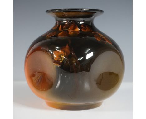 A striking Rookwood Pottery bulbous vase with a flared rim, featuring a rich ombre glaze transitioning from deep brown to war