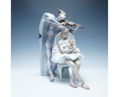 A limited edition Lladro porcelain figurine titled Jester's Serenade (Arlequin Enamorado), model number 01005932. Designed by