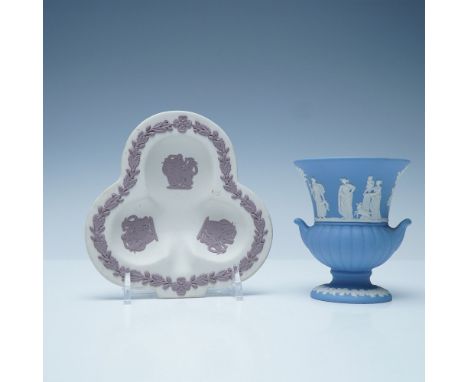 A charming set of two Wedgwood Jasperware pieces, including a blue urn-shaped vase (3.5"H) and a lilac-trimmed clover-shaped 