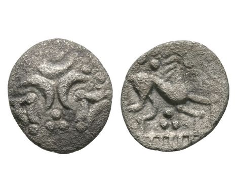 1-50 AD. Obv: three crescents back to back with pellet-tipped triangle in angles and pellet trefoil at points. Rev: horse rig