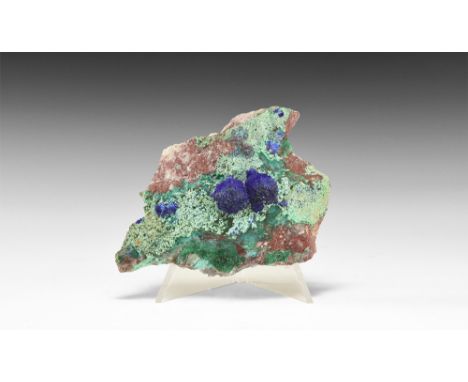 A fine specimen consisting of two globular clusters of bright azurite crystals surmounting a matric of malachite, with additi