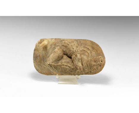 Dated 1927.   A master model in surface-treated plaster of two crocodiles fighting in water, on a textured base, with incised
