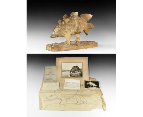 Circa 1930.   A surface-treated plaster master model of a Stegosaurus on a textured base with two rows of armoured flanges to