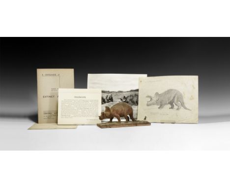 Circa 1930.   A model of Triceratops on a textured rectangular wooden base directly carved by Vernon Edwards, possibly the mo