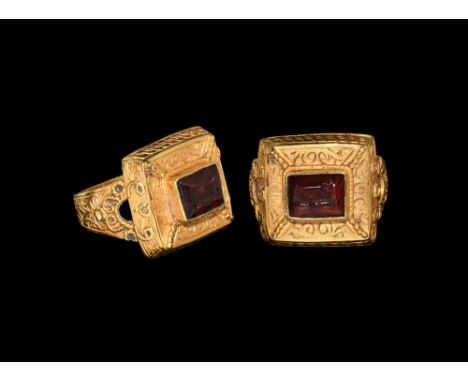 12th-13th century AD.A garnet cloison intaglio with calligraphic text, possibly the personal name of the owner, set into a la