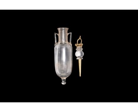 4th-1st century BC. A rock crystal bottle in the form of an amphora with wide rim and long neck, pointed handles to the side;