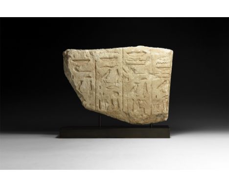 New Kingdom, 1550-1077 BC.A substantial sub-rectangular carved stone panel fragment with four columns of hieroglyphic text re