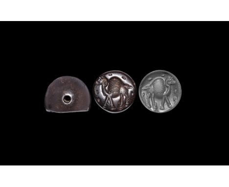 3rd-7th century AD.A plano-convex haematite stamp seal with an intaglio advancing camel. Cf. Gyselen, R. Acta Iranica 44. Sas