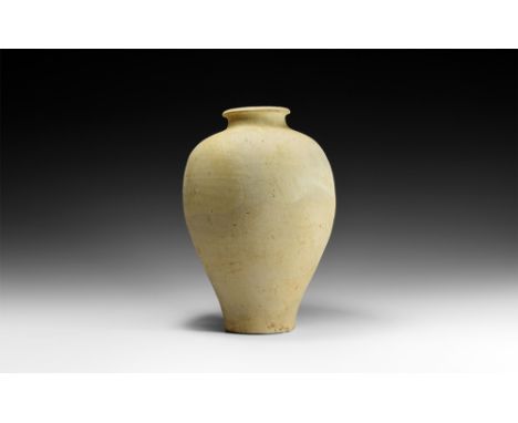 Song Dynasty, 960-1279 AD.A tall piriform ceramic jar with narrow base, tapering neck and everted rim. 2.5 kg, 30.5cm (12").F