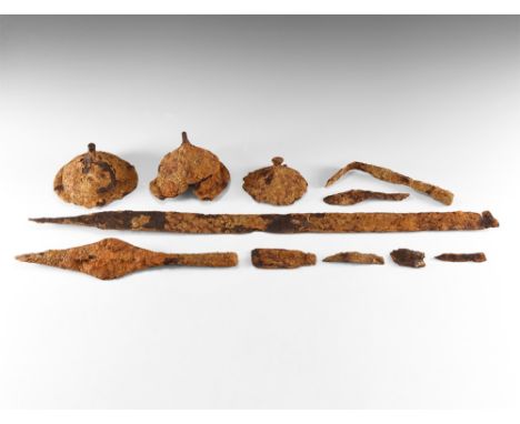 6th century AD.A group of iron weapons comprising: a sword with parallel-sided blade, shallow shoulders, tapering tang, remai