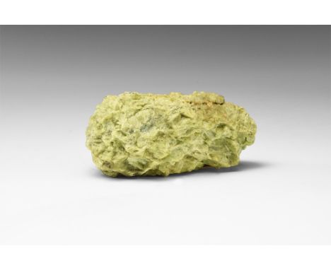 A specimen of vesuvianite (formerly called idocrase) from the classic discovery locality on Mt Vesuvius, Italy; in white card