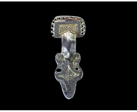 6th-7th century AD.   A silver-gilt square-headed bow brooch with rectangular headplate, shallow carinated bow and lozengifor