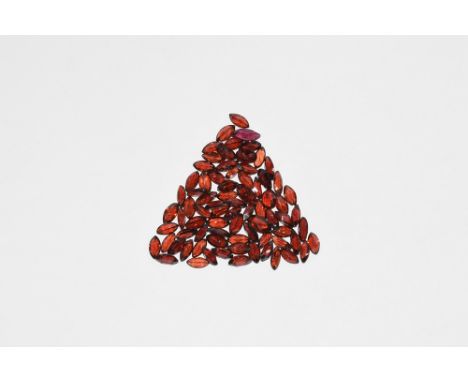 A group of seventy-seven marquise-cut garnets of a deep red colour, approximately 65 carats in total. 13 grams total, 6-10mm 