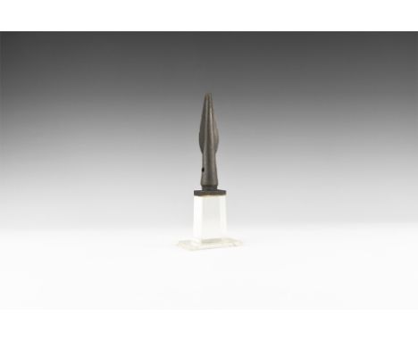11th-9th century BC.A bronze spearhead with socket, with plain leaf-shaped blade; the socket with two perforations for a fixi