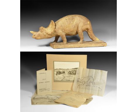 Circa 1930.   A master model in surface-treated plaster of a Triceratops on a textured base; three preparatory sketches on tr