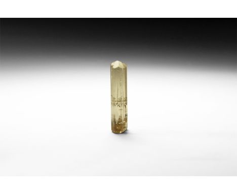 A fine, gem quality crystal of yellow apatite from Durango, Mexico; in old white card tray. See Bonewitz, Dr. Ronald Louis, R