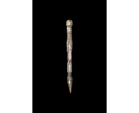 15th century AD.A hollow-formed hexagonal-section pointer with parcel-gilt detailing, knop finial with studs and median gusse