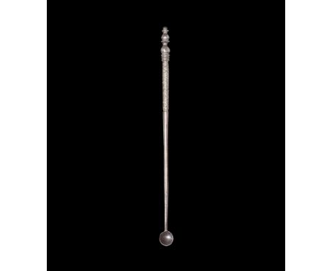 1st-2nd century AD.A silver medicinal or cosmetic spoon with small discoid bowl, tapering shank with hatched grip and baluste
