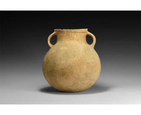 3rd millennium BC.A large bulbous ceramic jar with broad neck, two strap handles, band of impressed points below the rim. 1.5