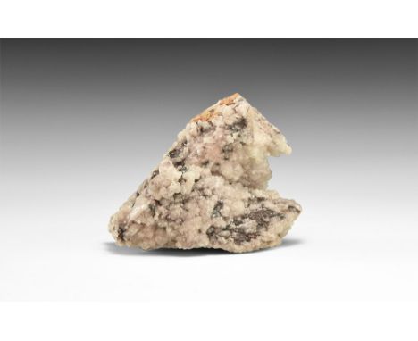 A specimen comprised principally of barrel-shaped, multiple-growth calcite crystals, with haematite, from Cumbria, UK; in whi