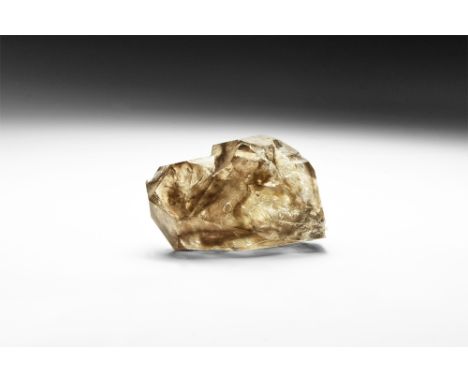 An unusual double-terminated smoky quartz crystal from Cumbria exhibiting notable colour zoning, fluid inclusions, and access