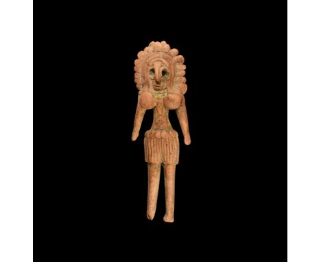 4th-3rd millennium BC.A ceramic standing figure female wearing a large headdress, hooked nose, pierced holes for eyes, applie