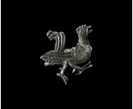 13th-14th century AD.   A pewter badge in the shape of a running cockerel with texture detail to the body, wings and comb, sp