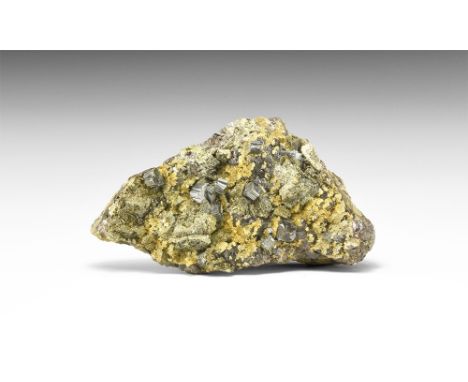 A specimen of bournonite exhibiting a number of 'cogwheel' crystals on a groundmass of a metallic sulfosalt mineral from the 