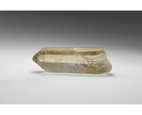 A fine, transparent smoky quartz crystals with numerous inclusions of anatase crystals near the termination; in old white car