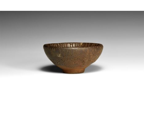 Song Dynasty, 960-1127 AD.A conical ceramic bowl with basal ring and brown 'hare's fur' glaze. 139 grams, 90mm (3 1/2").Fine 