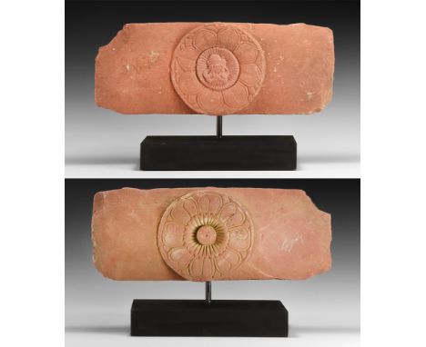 Shunga Period, 2nd century BC.A pink sandstone rail section from a Buddhist monument, with central medallion in the form of a