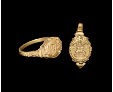 17th century AD.   A gold ring with D-section hoop widening at the shoulder decorated with a strap and pin motif; oval bezel 